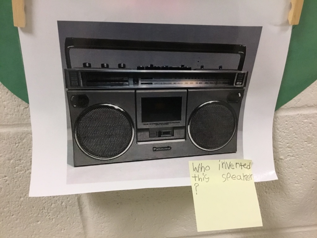 boombox photo with sticky note asking who invented this speaker?